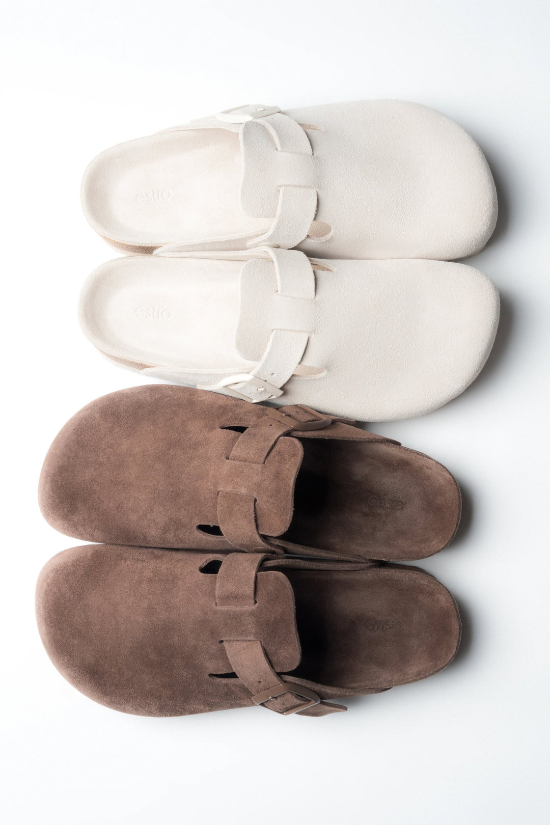 Estro: women's clog-style slides featuring a genuine velour upper.