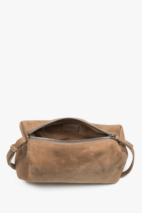 Close-up of soft beige natural velour texture.