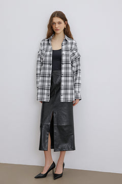 Checkered shirt shown with sleeves detached.