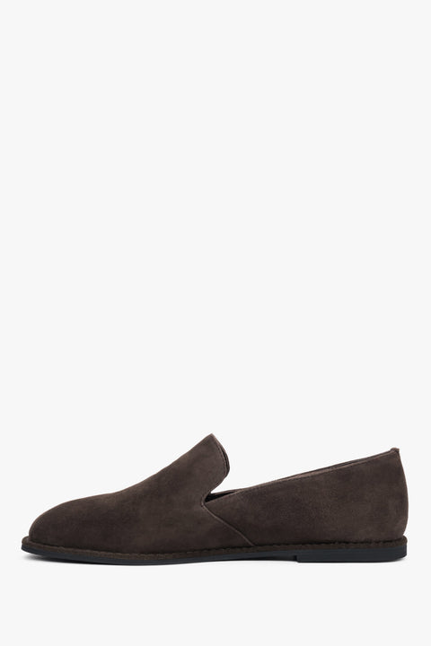 Close-up of soft dark brown natural velour texture.