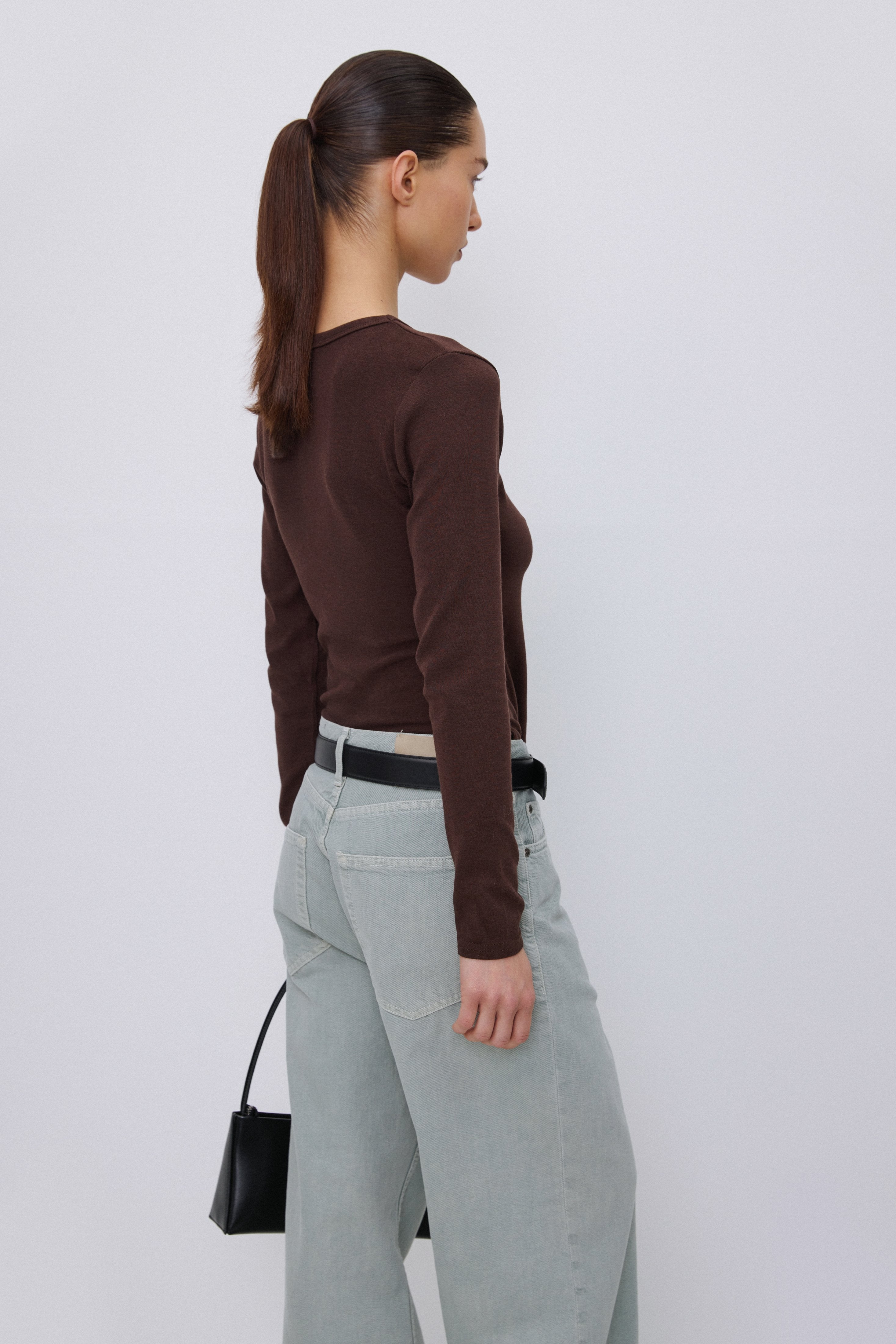 Simple silhouette of Estro basic long sleeve top.