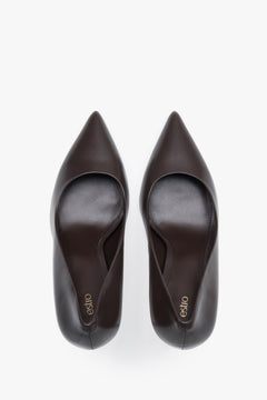 Rear view of dark brown genuine leather pumps.