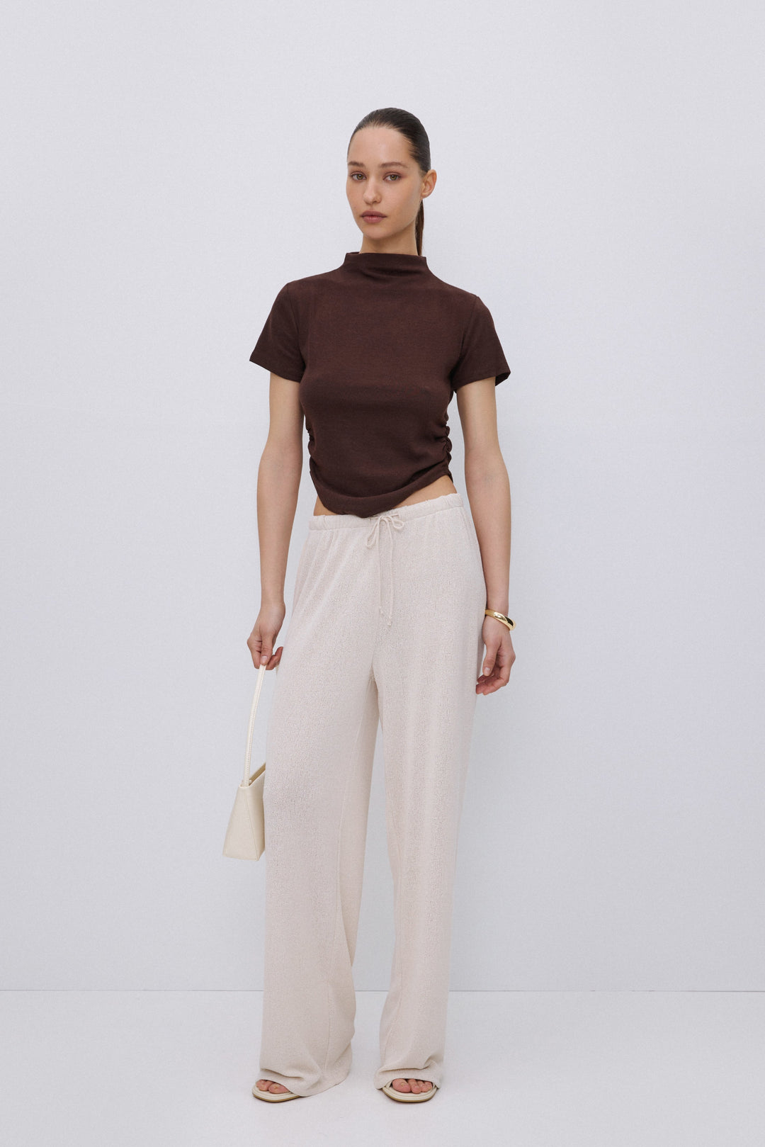 Soft dark brown cotton fabric texture.