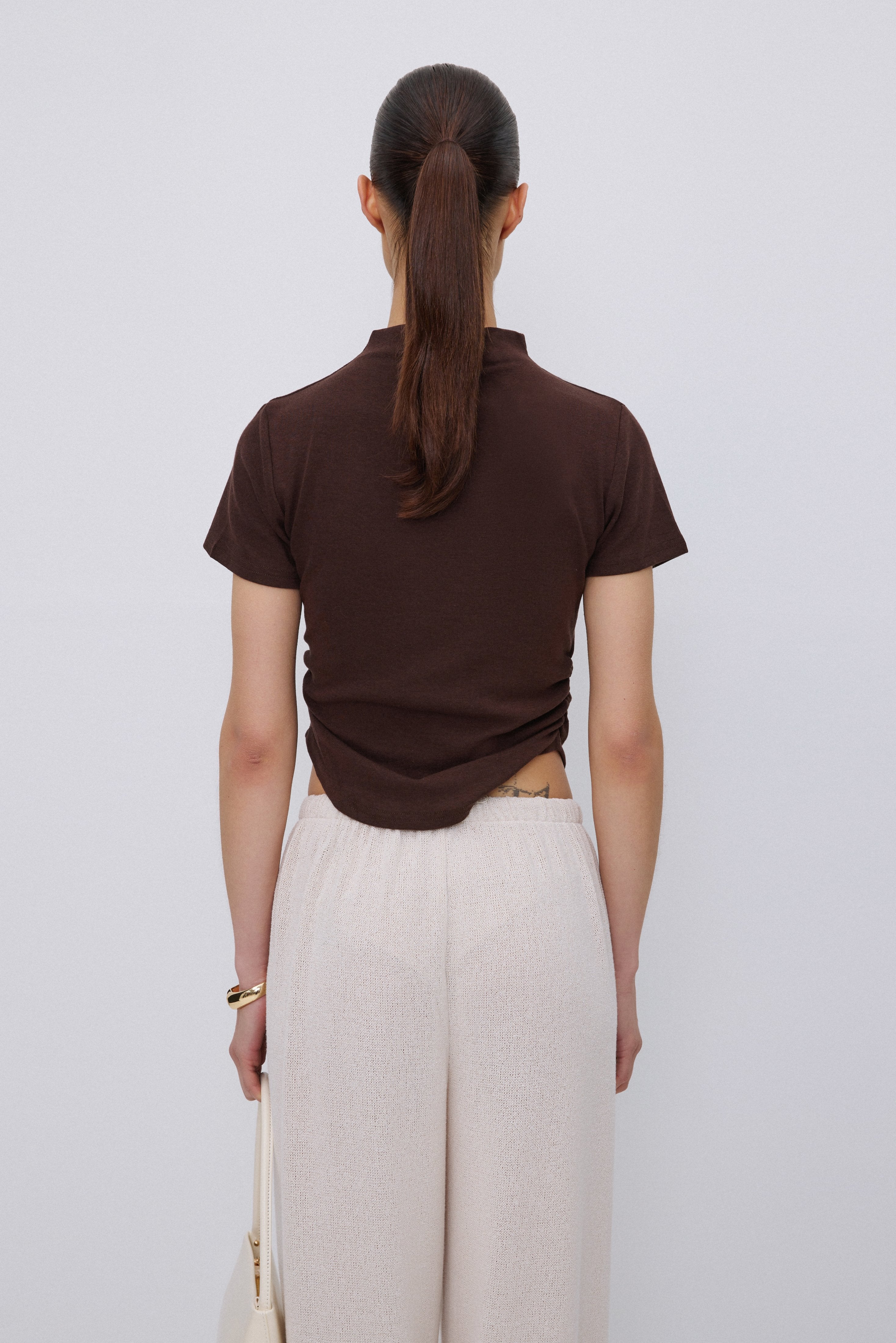 Back of women's dark brown soft cotton T-shirt.