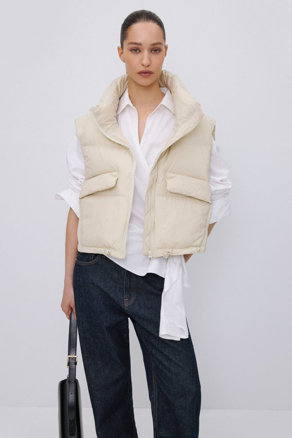 Short light beige puffer vest with zipper Estro.