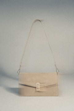 Small light beige shoulder bag in genuine velour Estro.