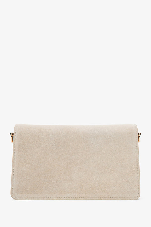 Back of small light beige genuine velour shoulder bag.