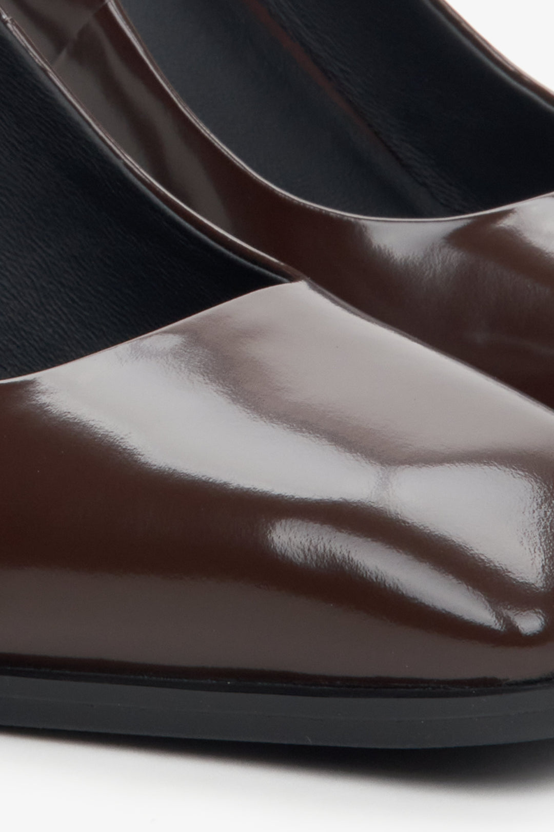 Women's leather high-heeled shoes - close-up on details.