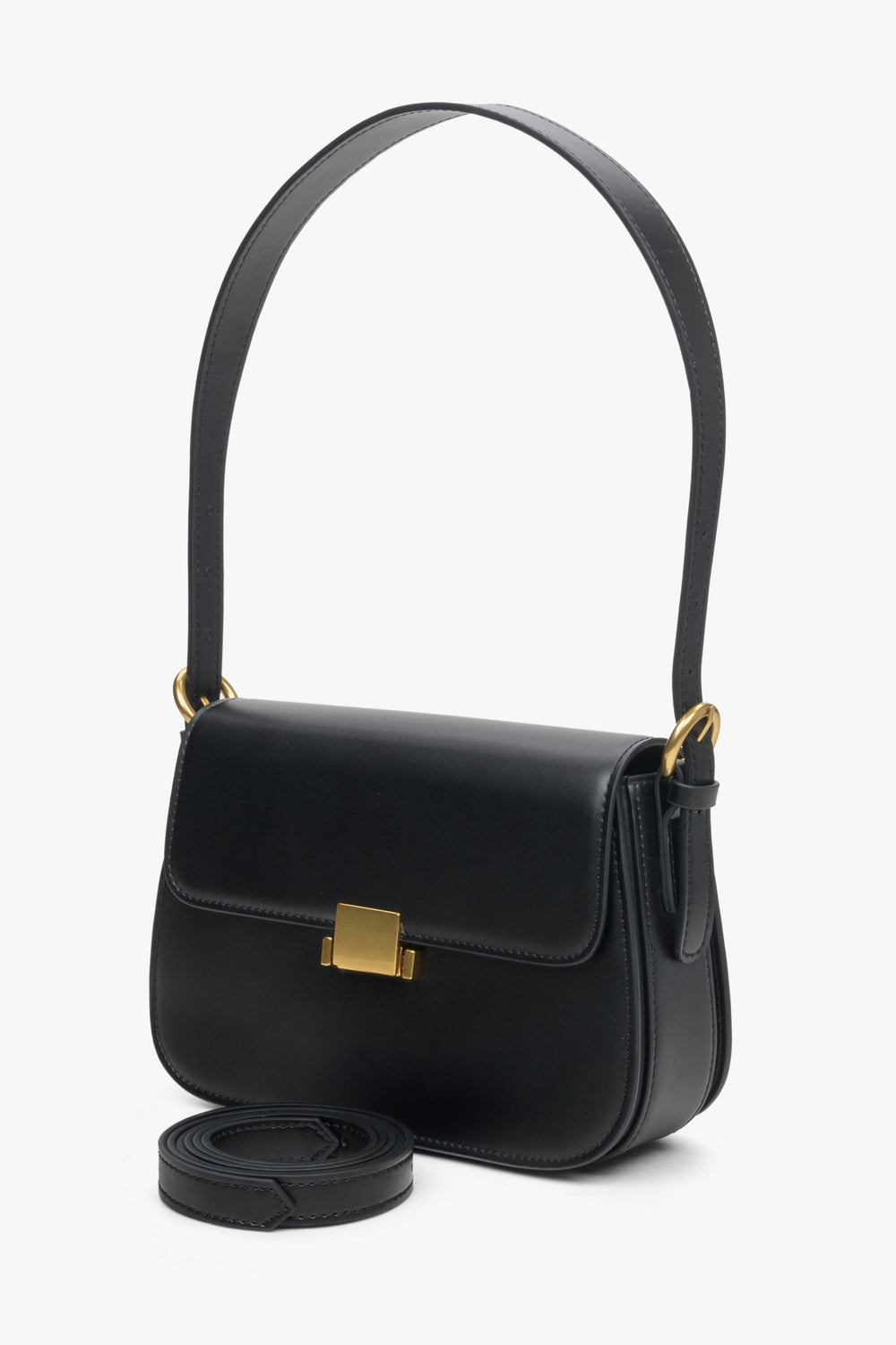 Women's black handbag made of genuine leather with gold accents by Estro.