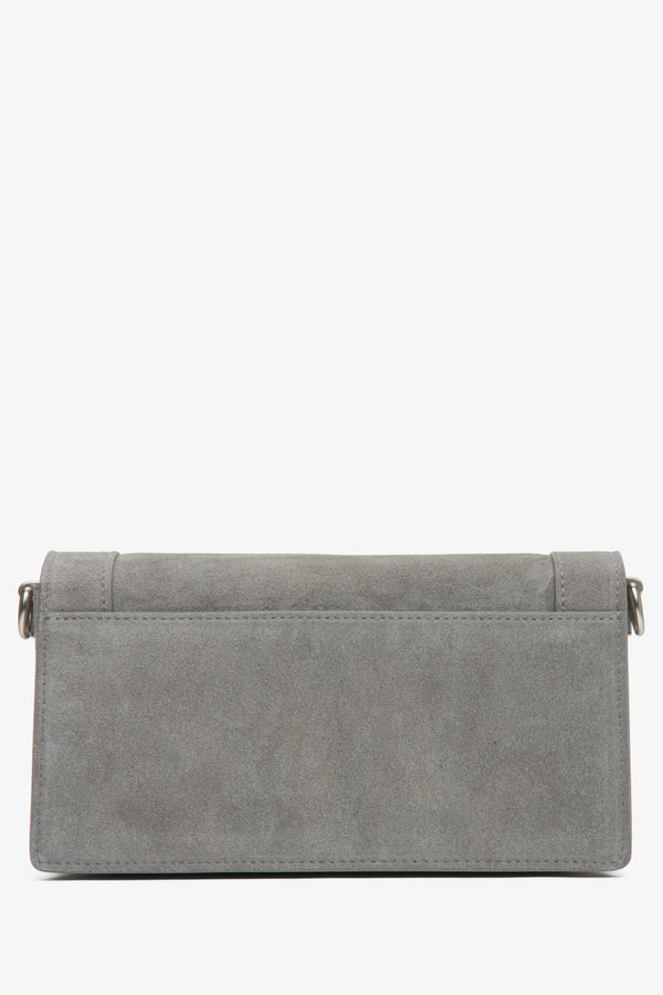 Women's small grey bag made of velour and leather - close-up of the back of the model.