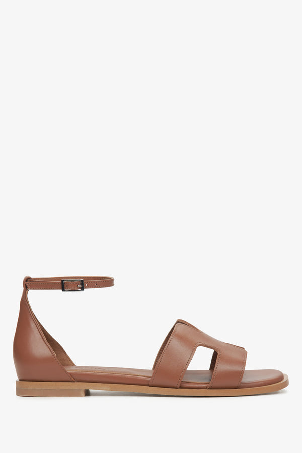 Women's brown sandals  - side view.