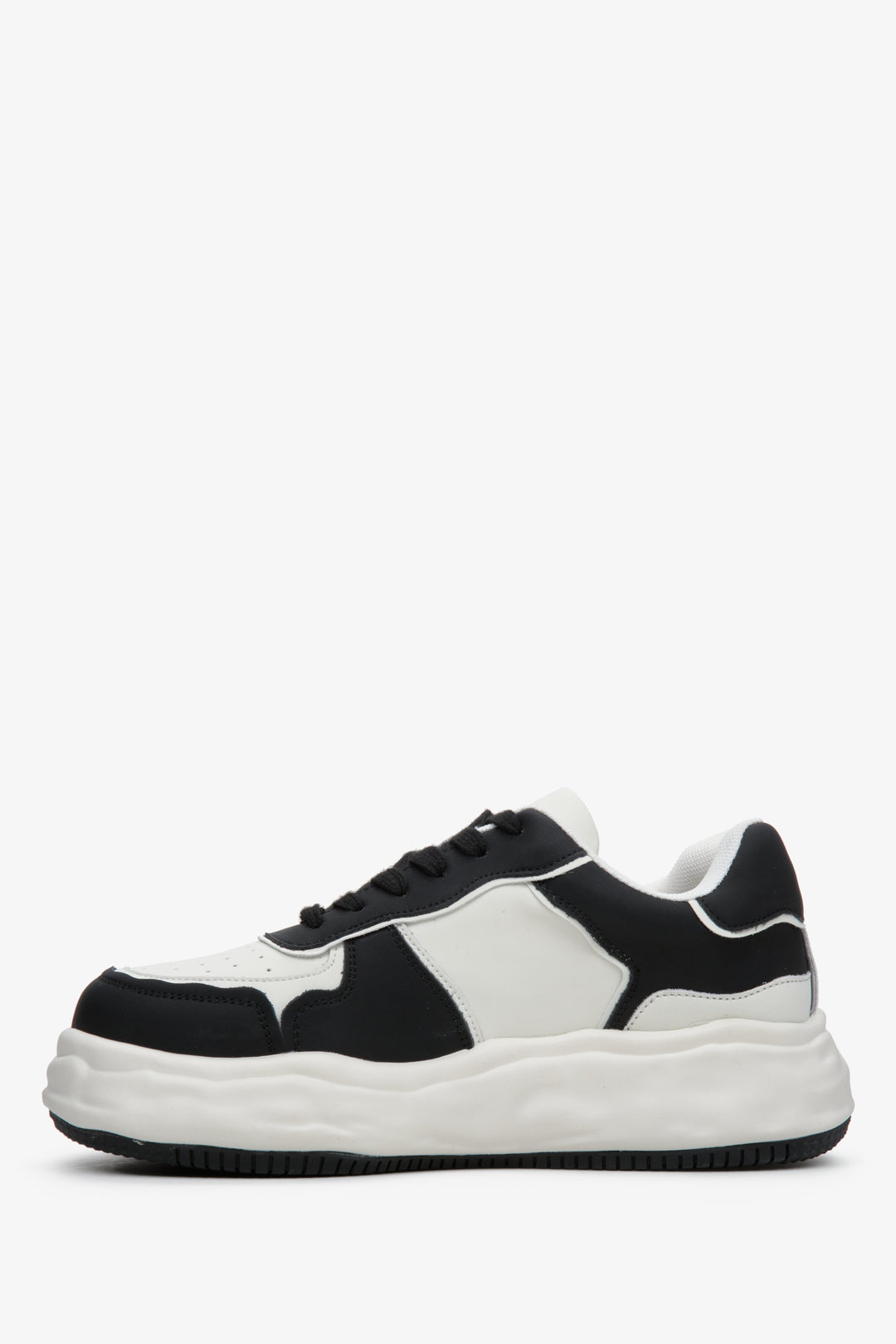 Women's leather sneakers by Estro in black and white.