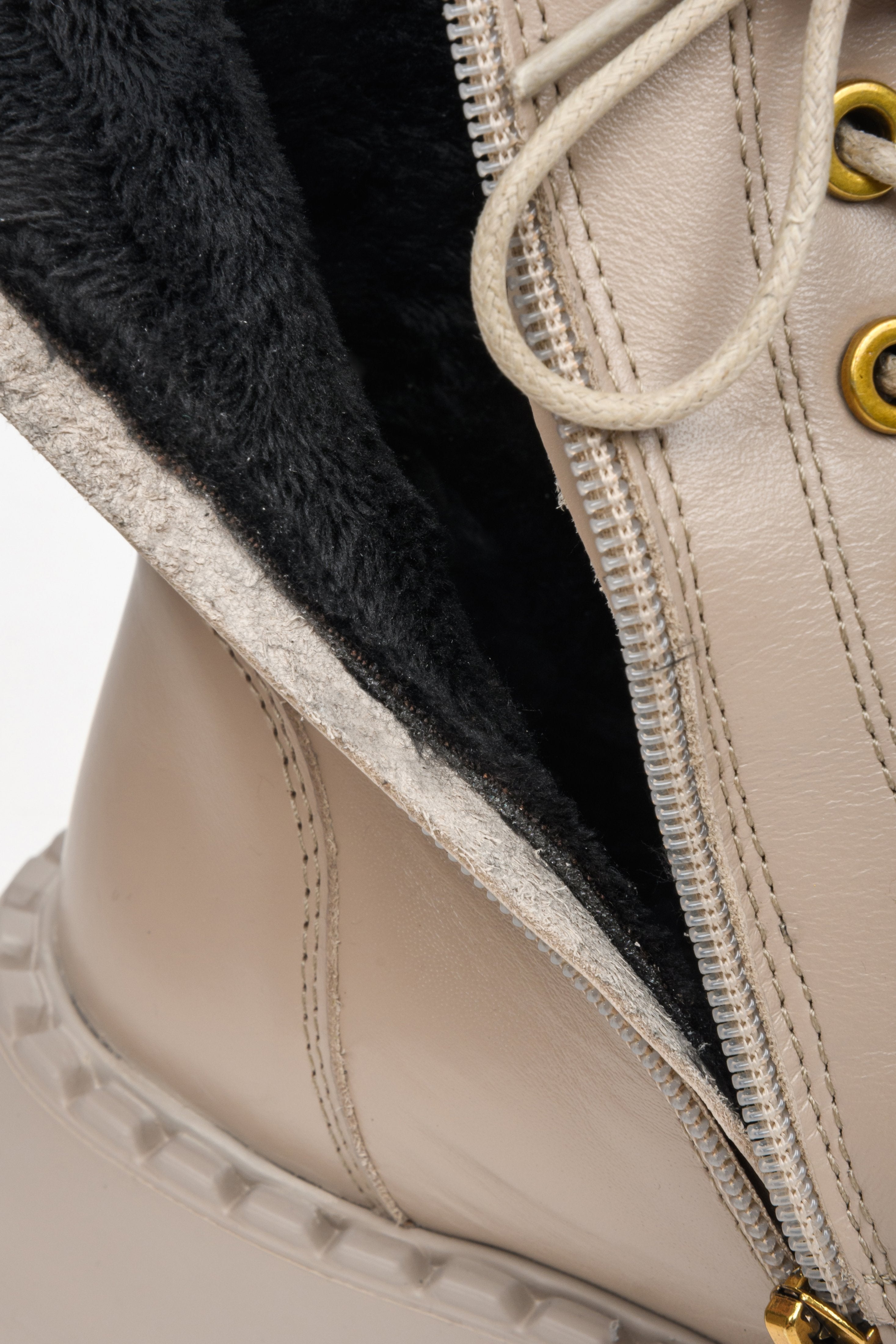 Women's beige leather Estro combat boots - close-up on the insulating fabric inside.