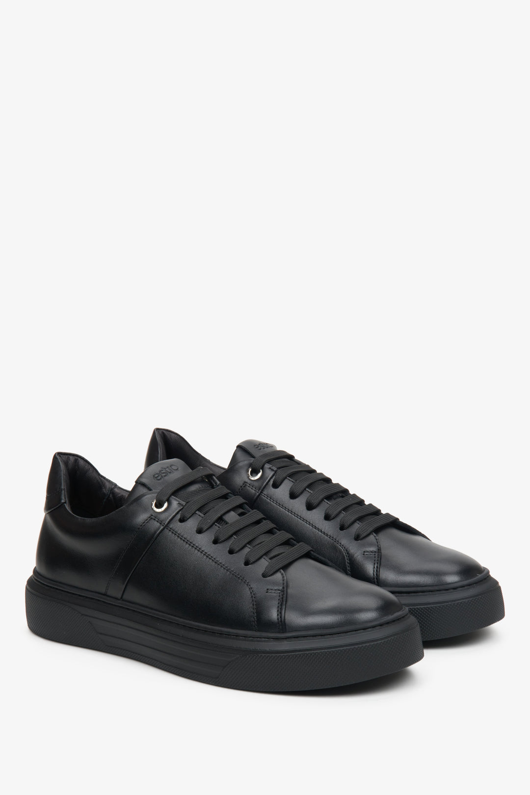 Leather black men's sneakers for autumn.