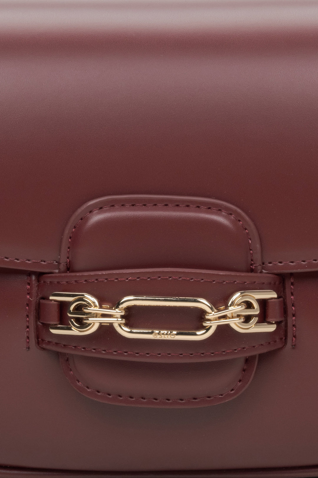 Women's burgundy leather bag - close-up on the detail.