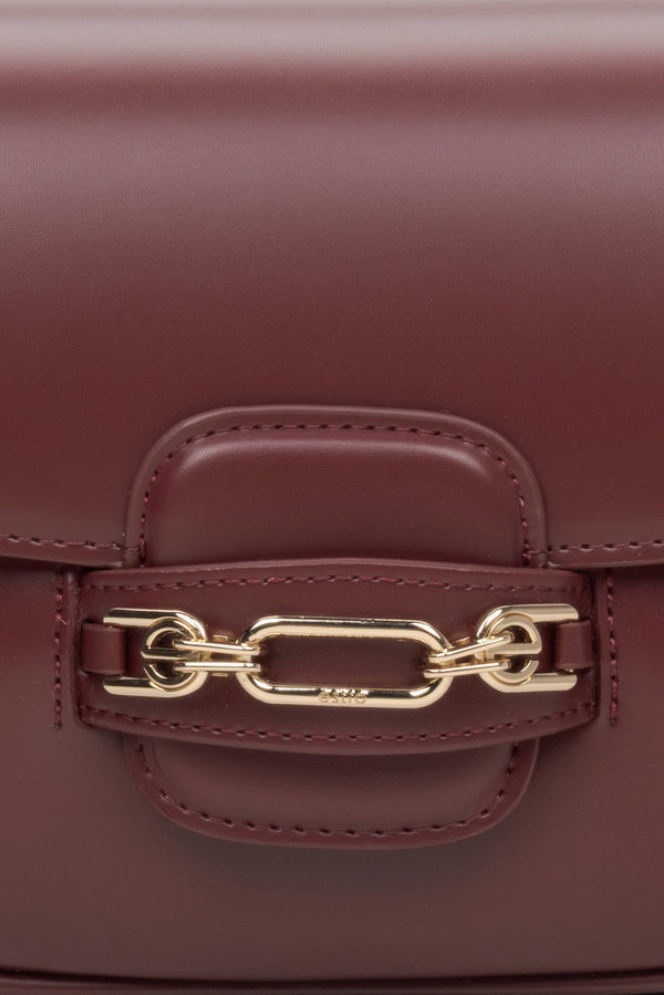 Women's burgundy leather bag - close-up on the detail.