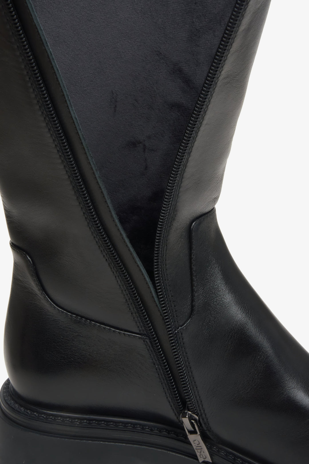 Women's black leather boots by Estro - close-up on the soft lining.