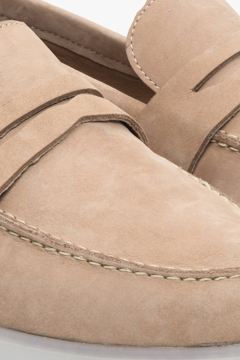 Beige nubuck men's moccasins by Estro - close-up on the stitching pattern.