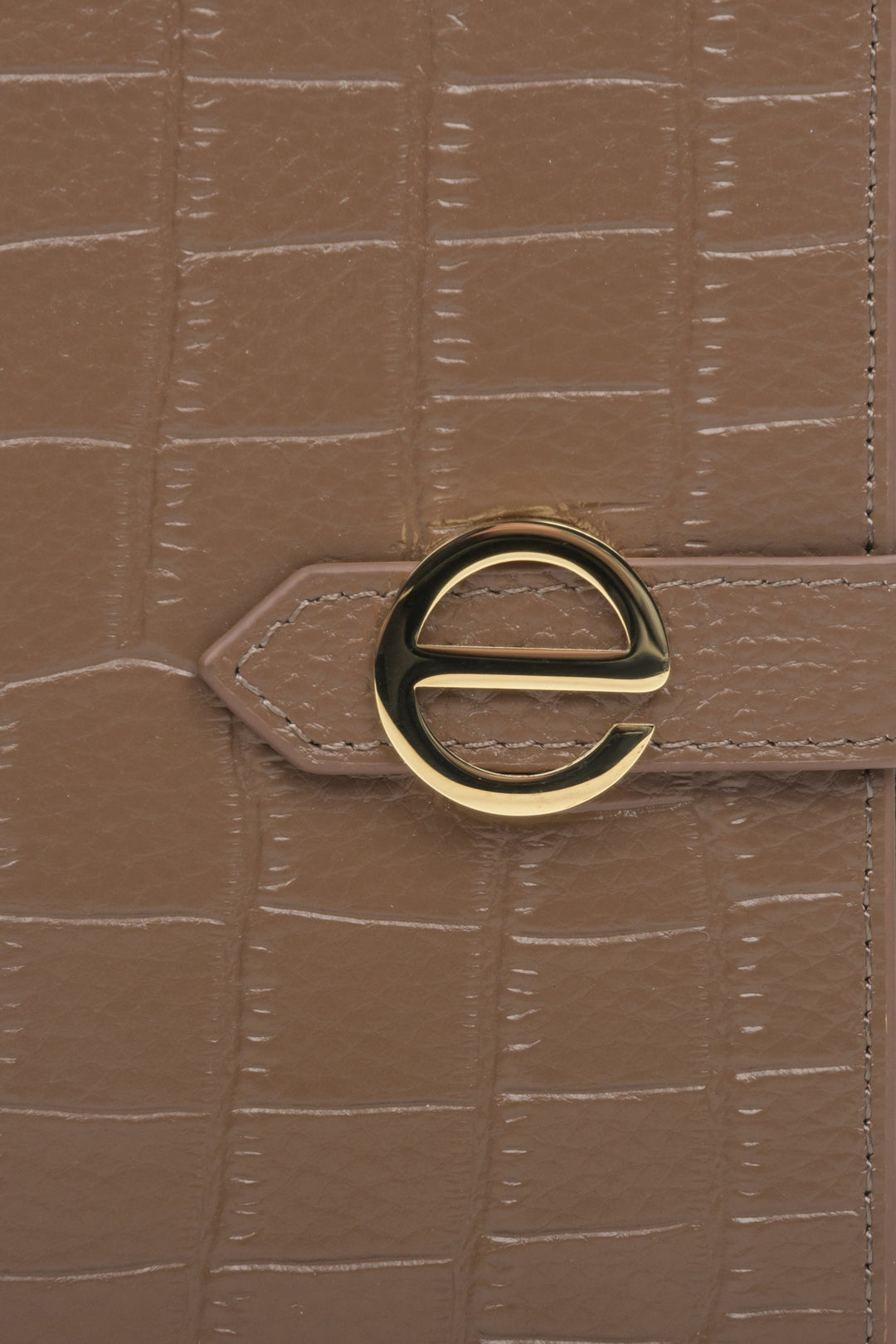 Women's large brown leather wallet by Estro - close-up on details.