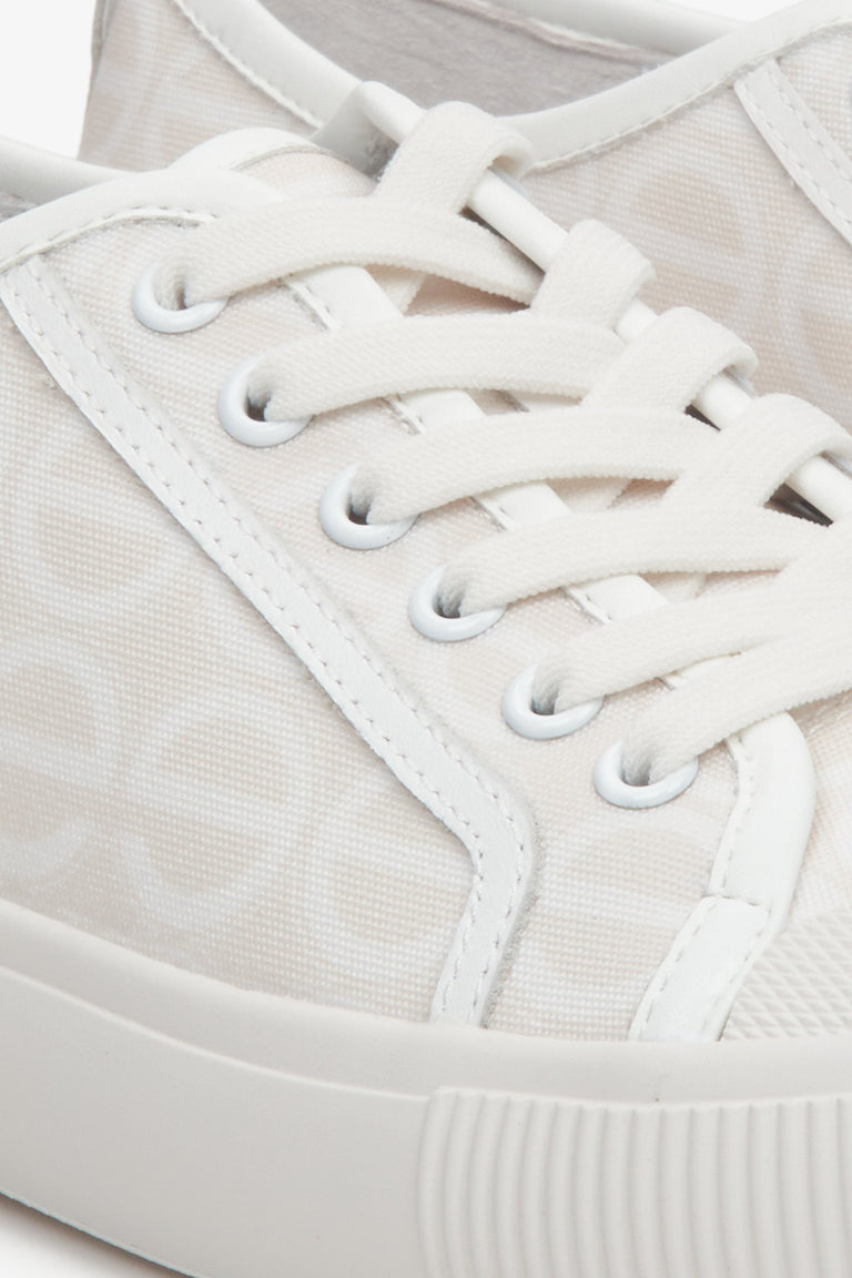 Estro women's low-top sneakers in white and light beige - close up on details.