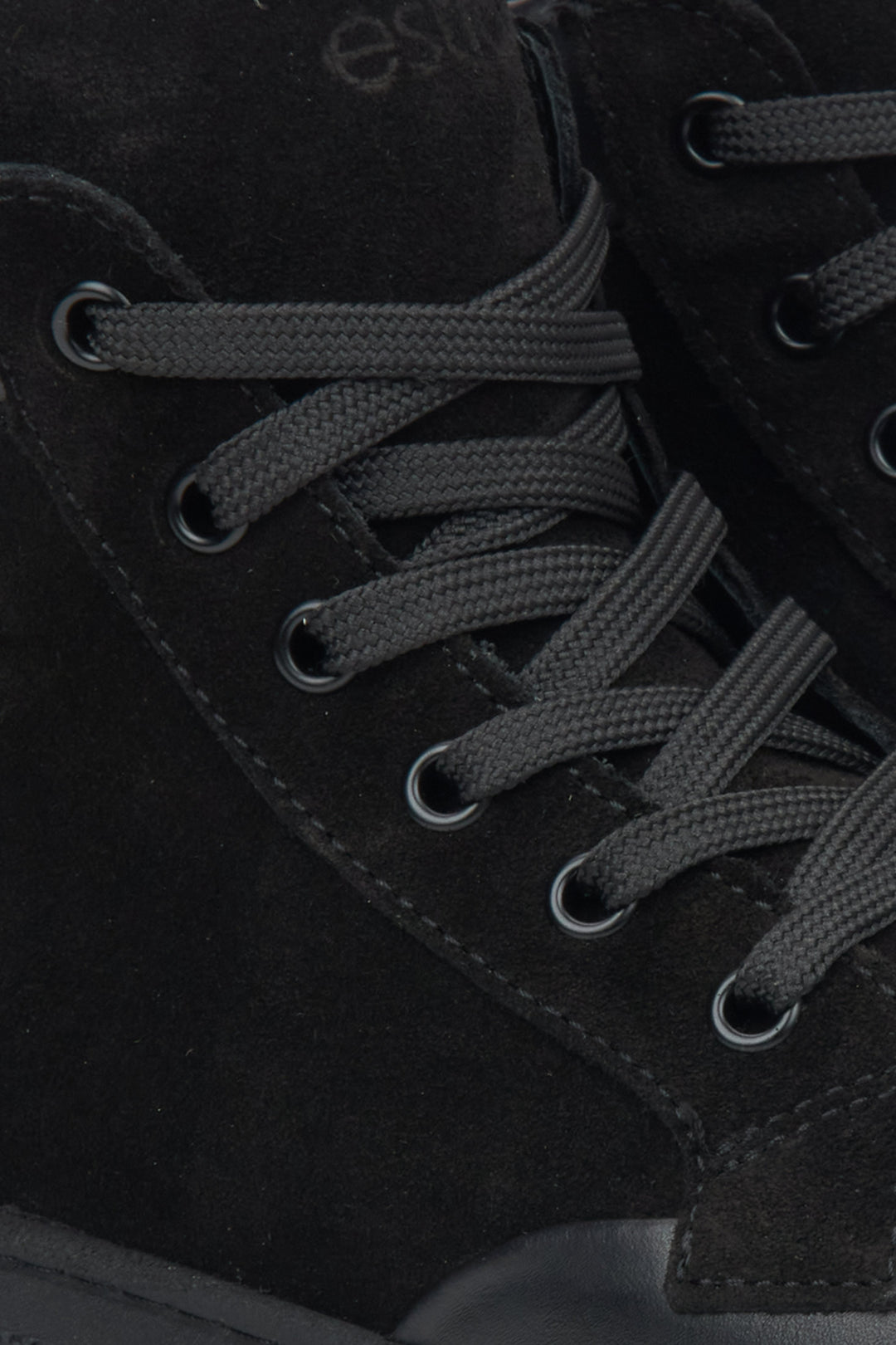 Black high-top sneakers by Estro - details.