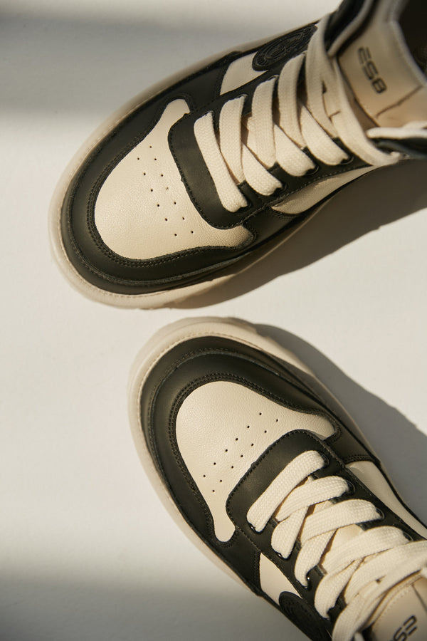 Women's velour and leather black and beige sneakers by Estro.