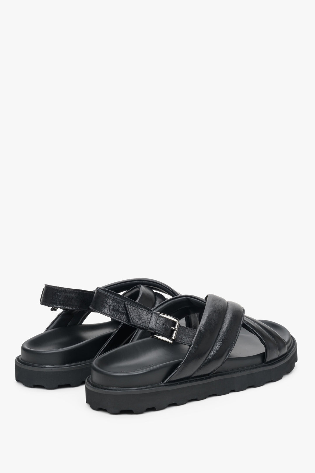 Men's black  cross-strap sandals by Estro - close-up of the back of the shoes and the side line.