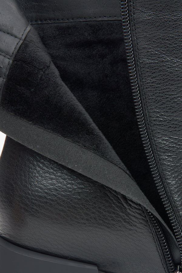 Women's black leather ankle boots with by Estro - close-up on the interior of the shoe.