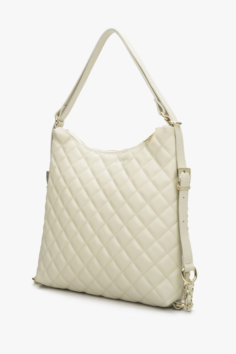 Women's quilted handbag in beige by Estro.