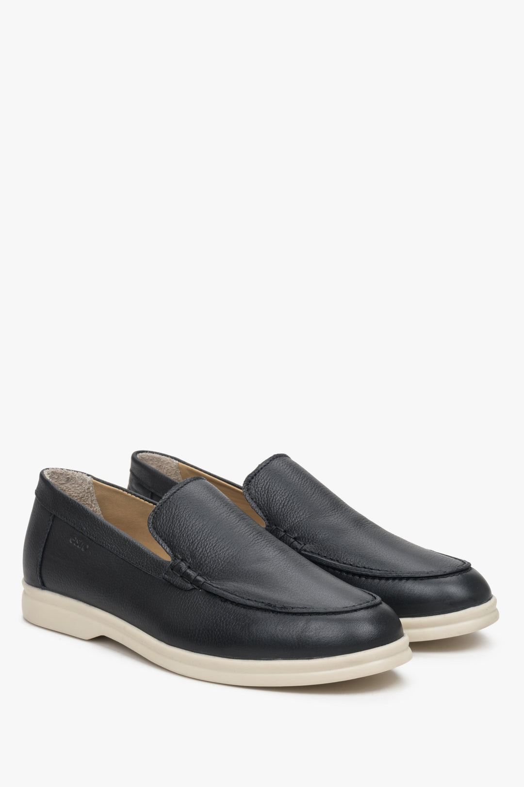 Stylish women's loafers in black leather - exhibiting the footwear's alternate side.