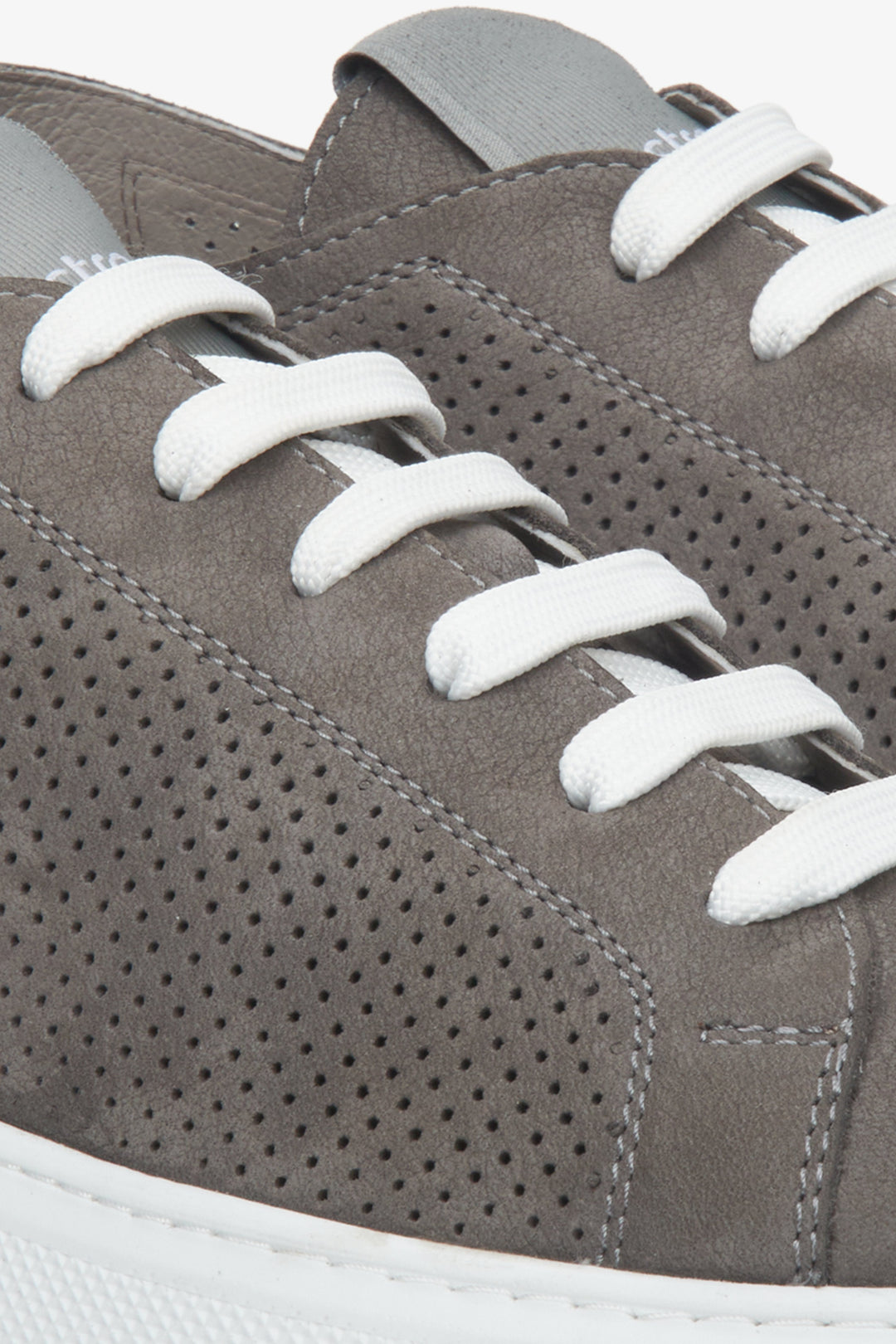 Men's summer leather, perforated by Estro - a close-up on details.