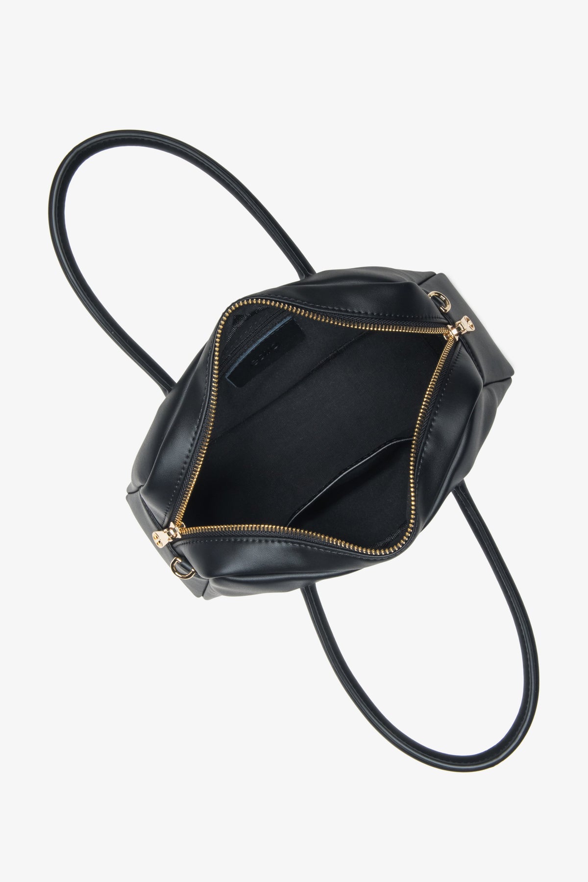Stylish black women's handbag by Estro, crafted from genuine leather, featuring a classic boxy shape – interior view of the model.