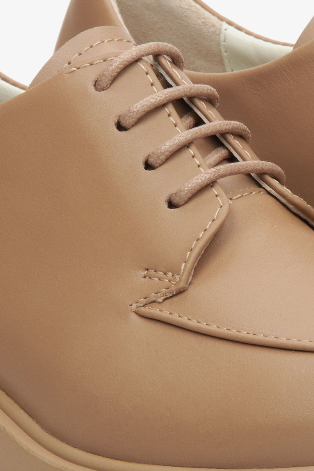 Women's brown platform lace-up shoes by Estro - close-up on the details.