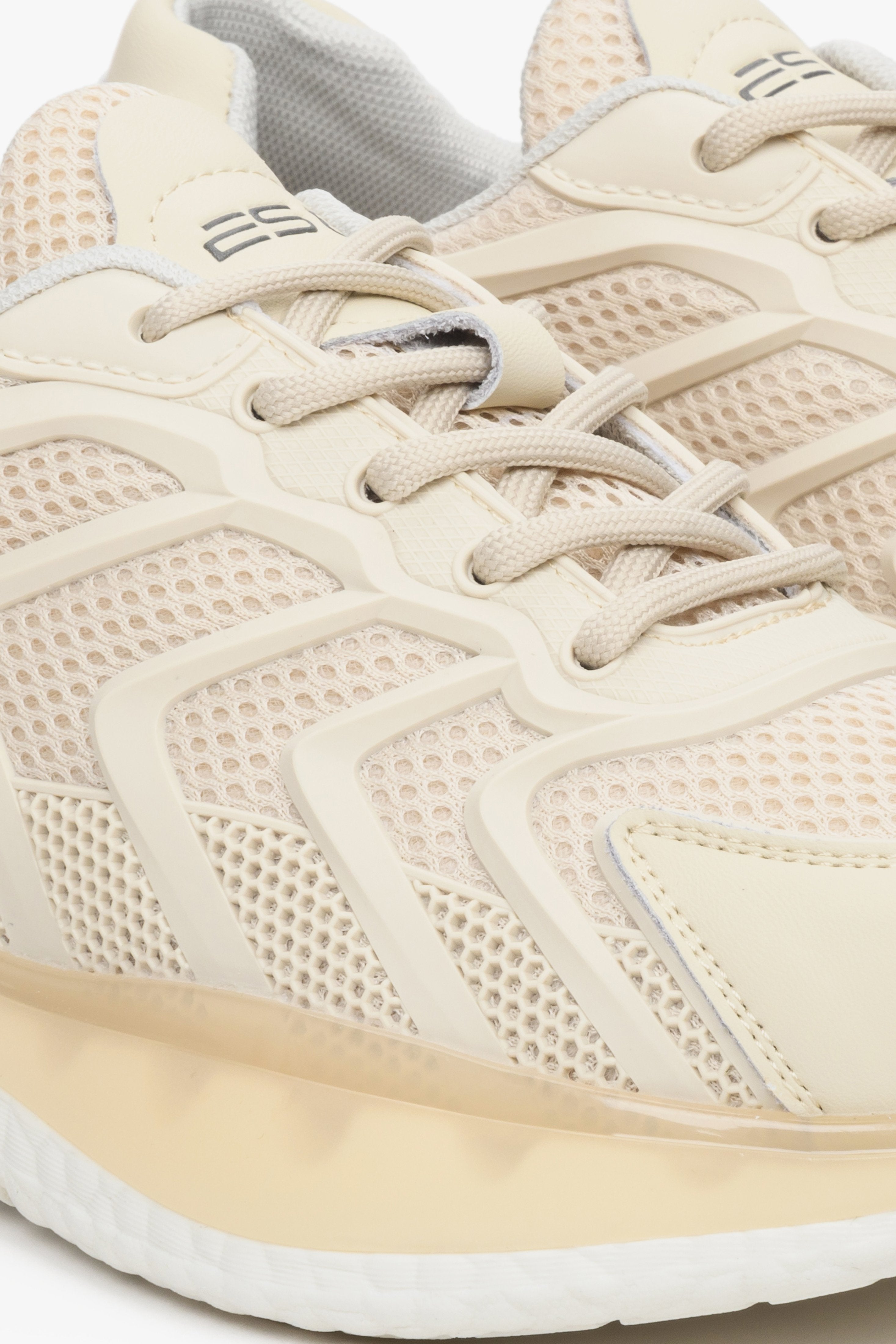 Women's beige sneakers by ES8 - close-up of the laces.