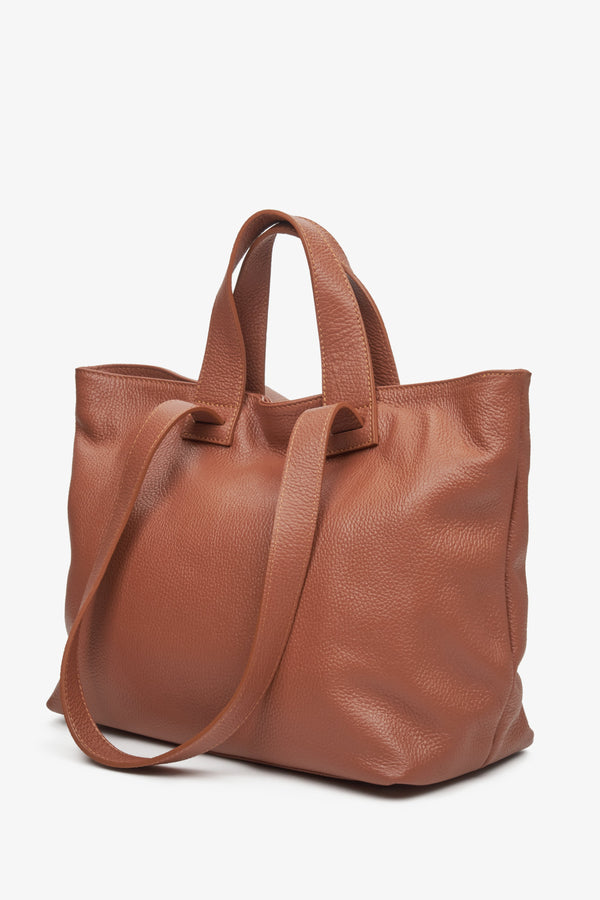 Women's large brown shopper-style handbag.