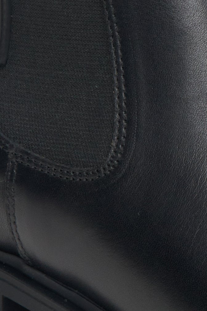 Women's black leather Estro Chelsea boots - close-up on the details.