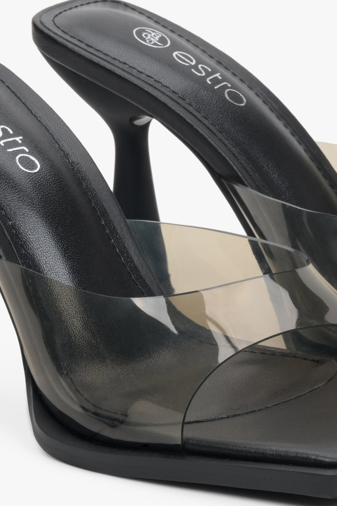 Estro women's clear sandals with a black sole - close-up on the details.