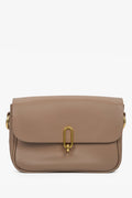 Women's brown shoulder bag made of genuine leather by Estro.