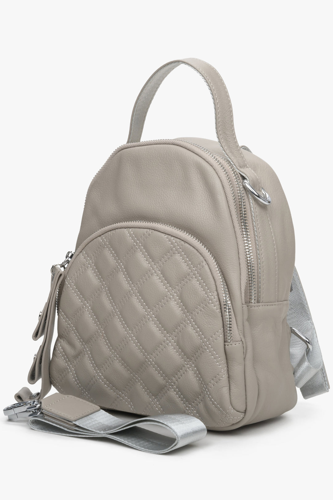 Small, urban women's beige backpack by Estro, perfect for fall - front view of the model.