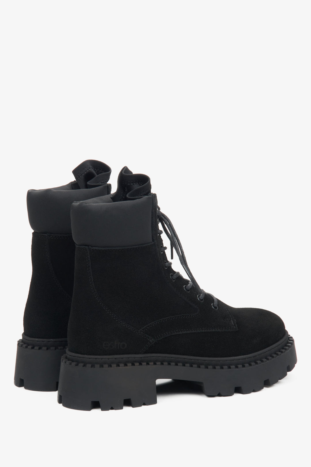 Black velour women's ankle boots by Estro - close-up of the heel and side line of the shoe.