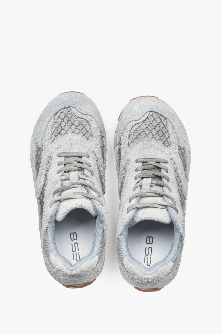 A pair of women's sneakers in grey, constructed from velour and textile fabric, model ES8.