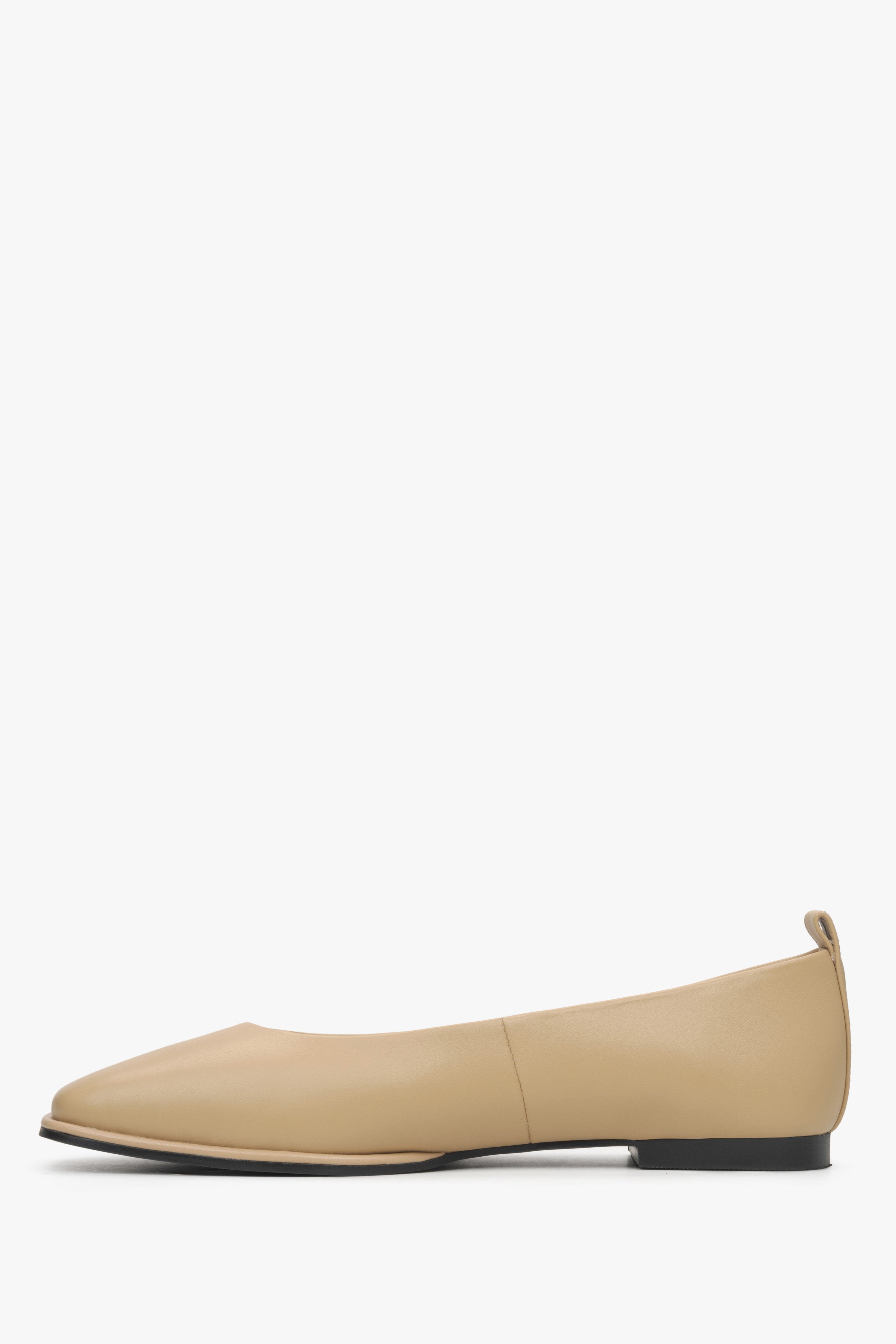 Profile of soft beige leather ballet flats for women.