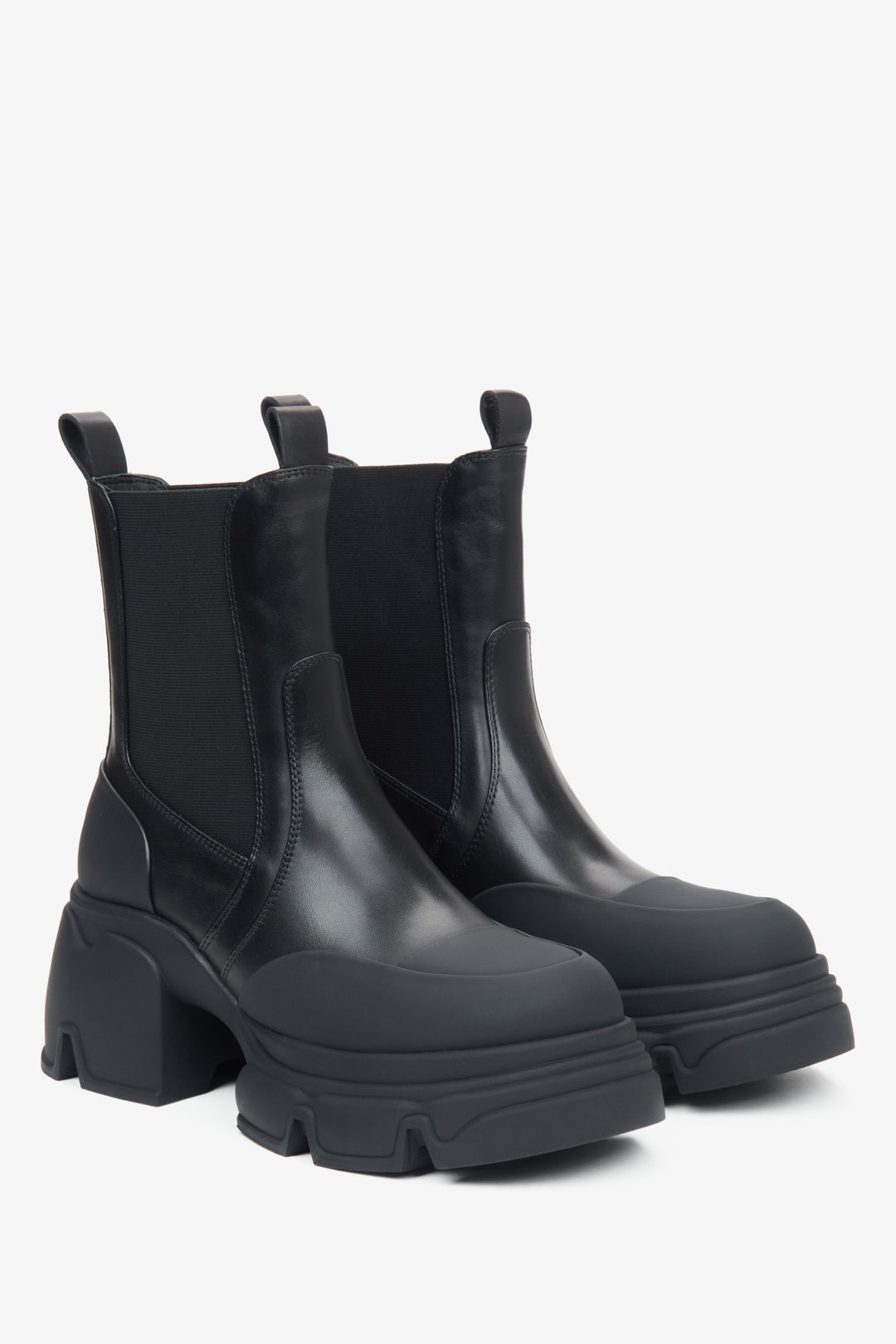 Black leather women's Chelsea boots on a platform by Estro.