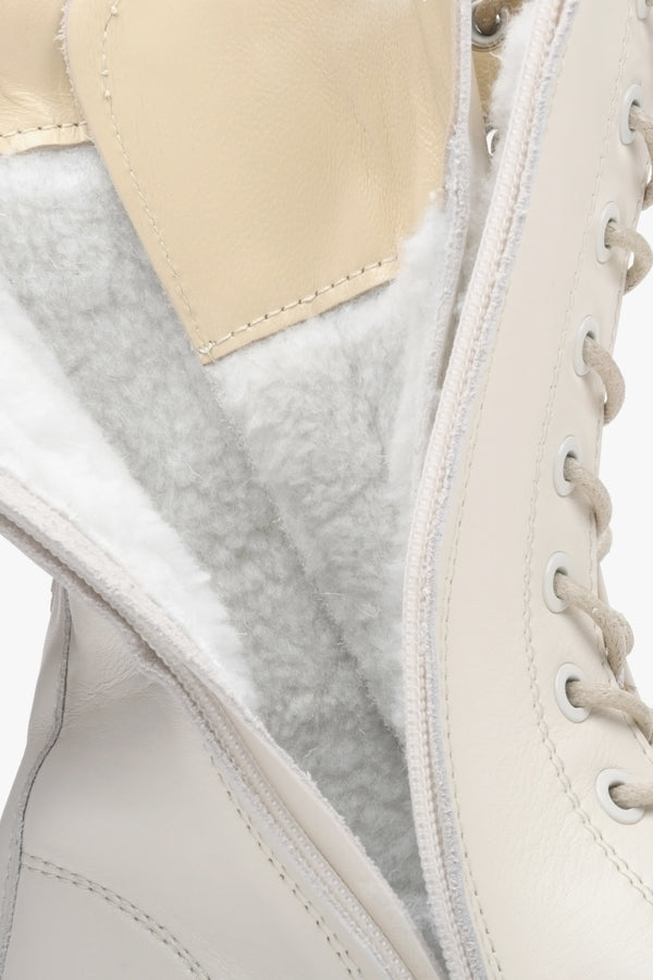 High lace-up boots made of natural beige leather by Estro - close-up on the shoe's lining.