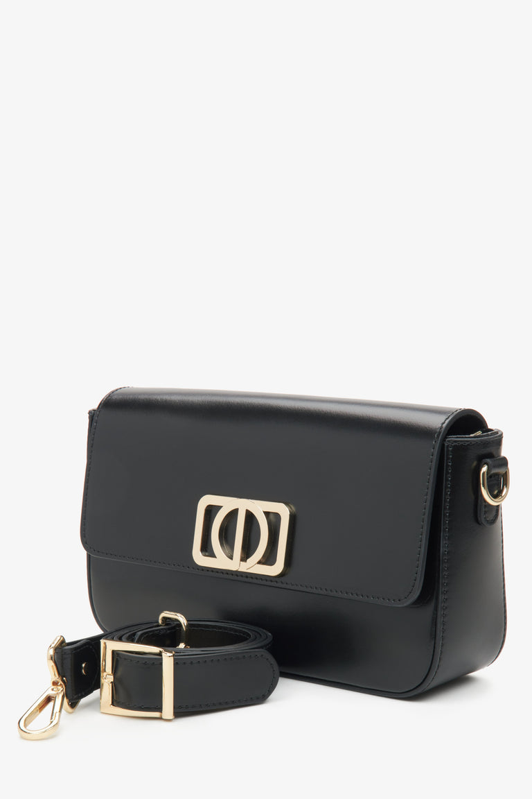 Black baguette-style handbag, small in size, designed for women.