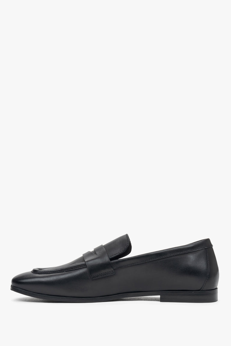 Women's black leather loafers.