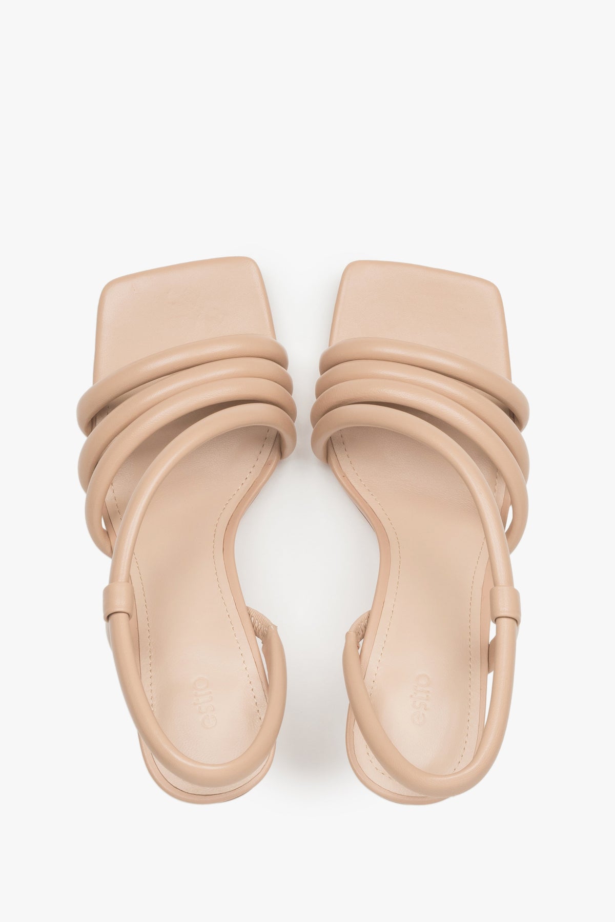 Heeled women's strappy sandals made of genuine leather in beige by Estro.