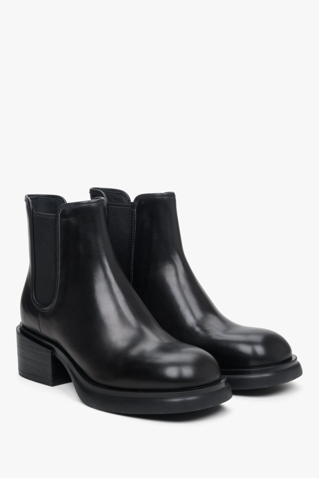 Women's black ankle boots with a block heel.