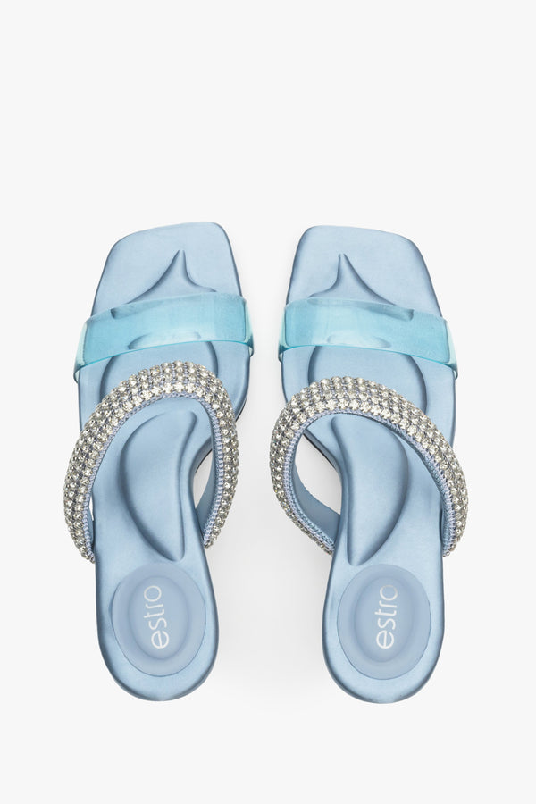 Women's elegant heeled blue mules with ornament.