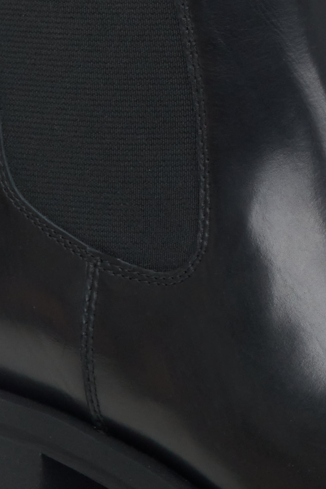 Women's leather Chelsea boots in black - a close-up on details.